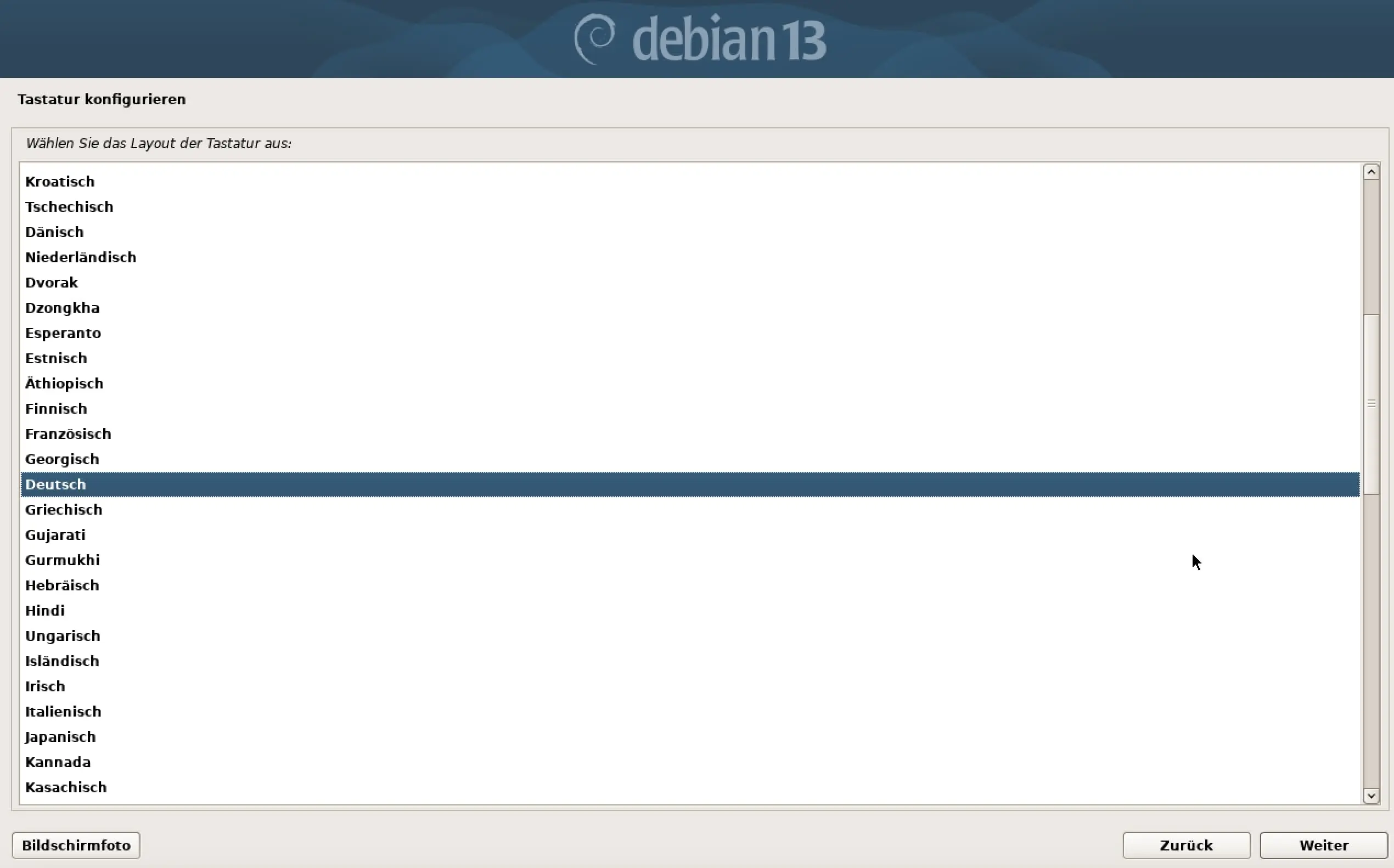 Bild: Screenshot der Debian-13-Installation: Tastaturlayout wählen